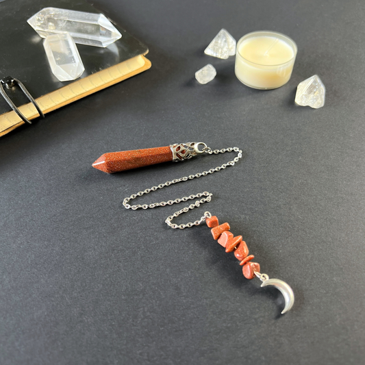 Goldstone pendulum with a crescent moon
