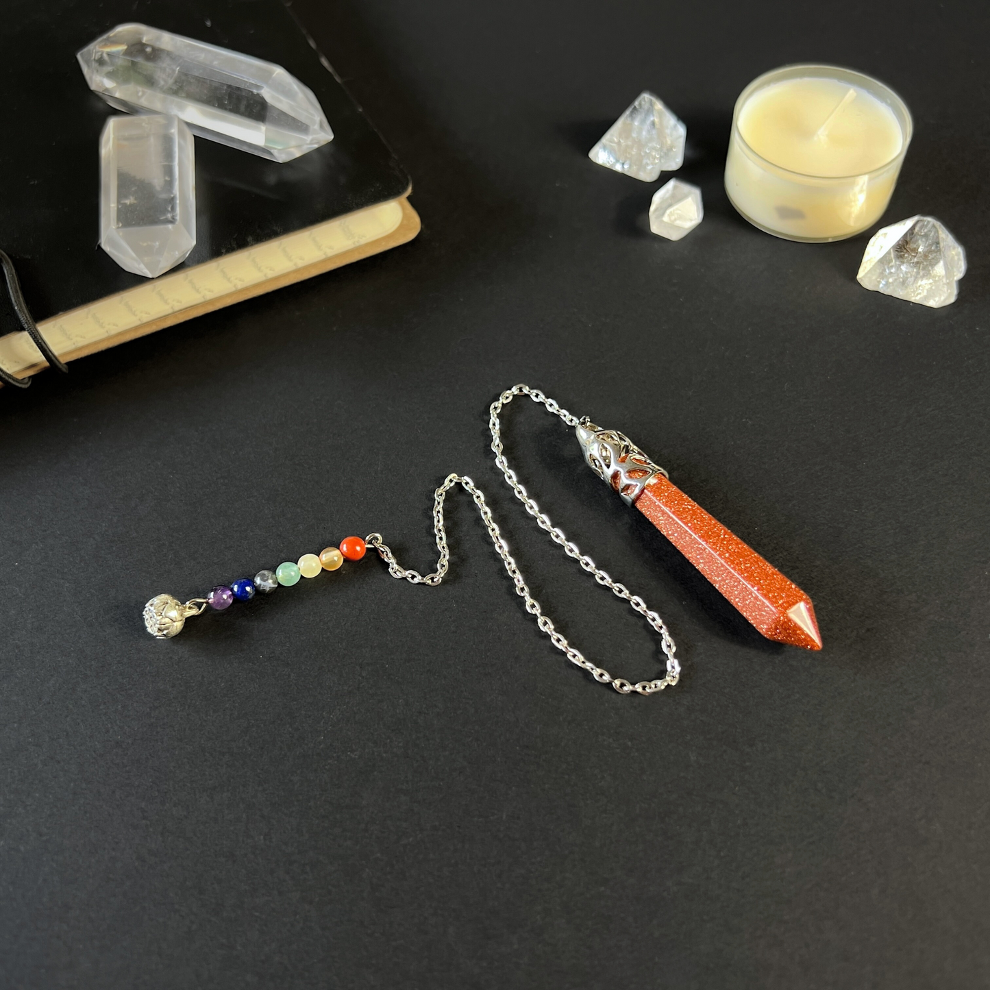 7 chakras goldstone pendulum with a lotus seed
