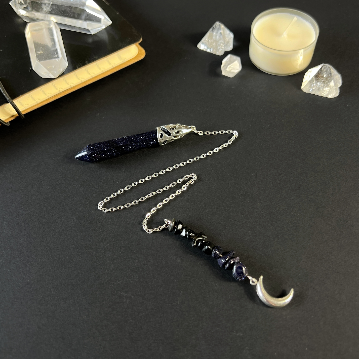 Blue sandstone pendulum with a Moon charm