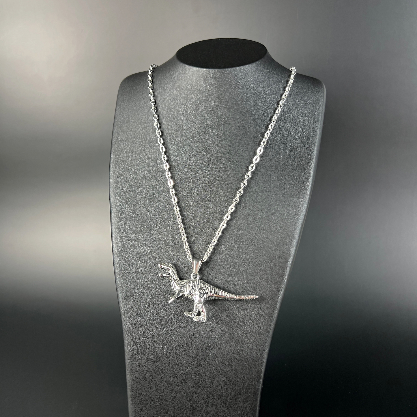Raptor dinosaur necklace