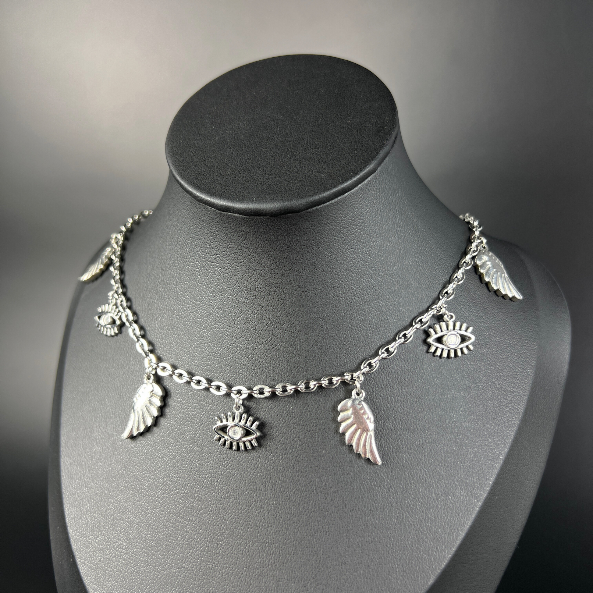 Biblical angel necklace, eyes and wings charms Baguette Magick