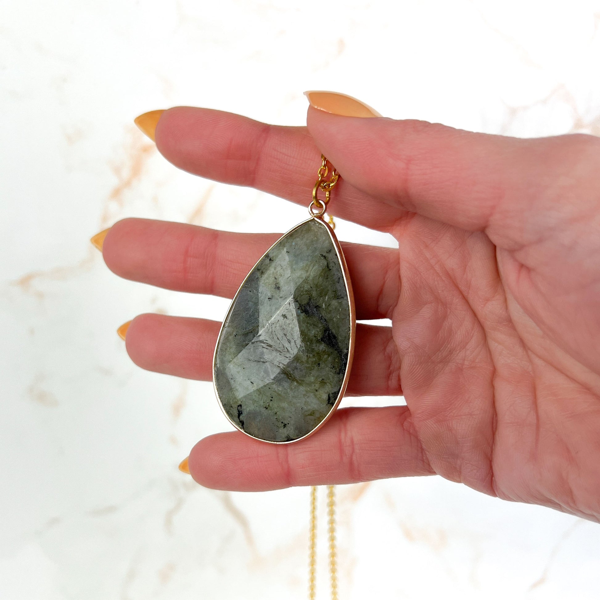 Labradorite necklace with a big faceted pendant golden tone Baguette Magick