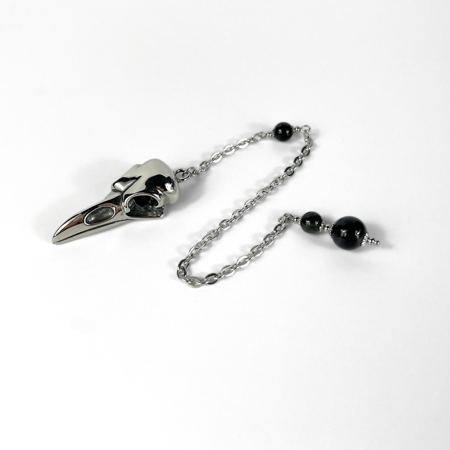 Raven skull and obsidian dowsing pendulum, stainless steel