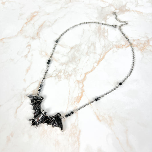 Stainless steel bat necklace with hematite beads Baguette Magick