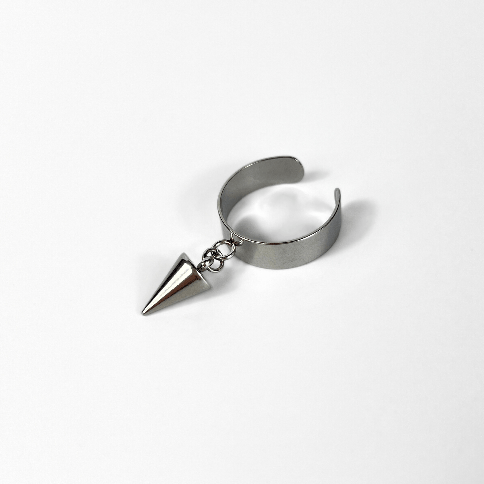 Sleek spikes or chain rings, polished stainless steel avant-garde jewelry Baguette Magick