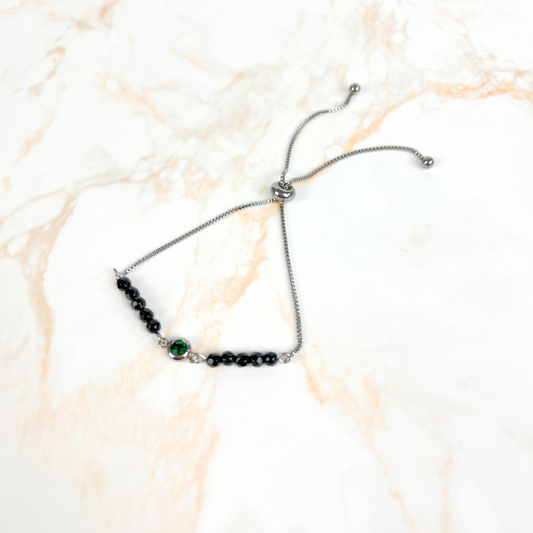 Bracelet coulissant en acier inoxydable avec onyx facetté et strass vert émeraude