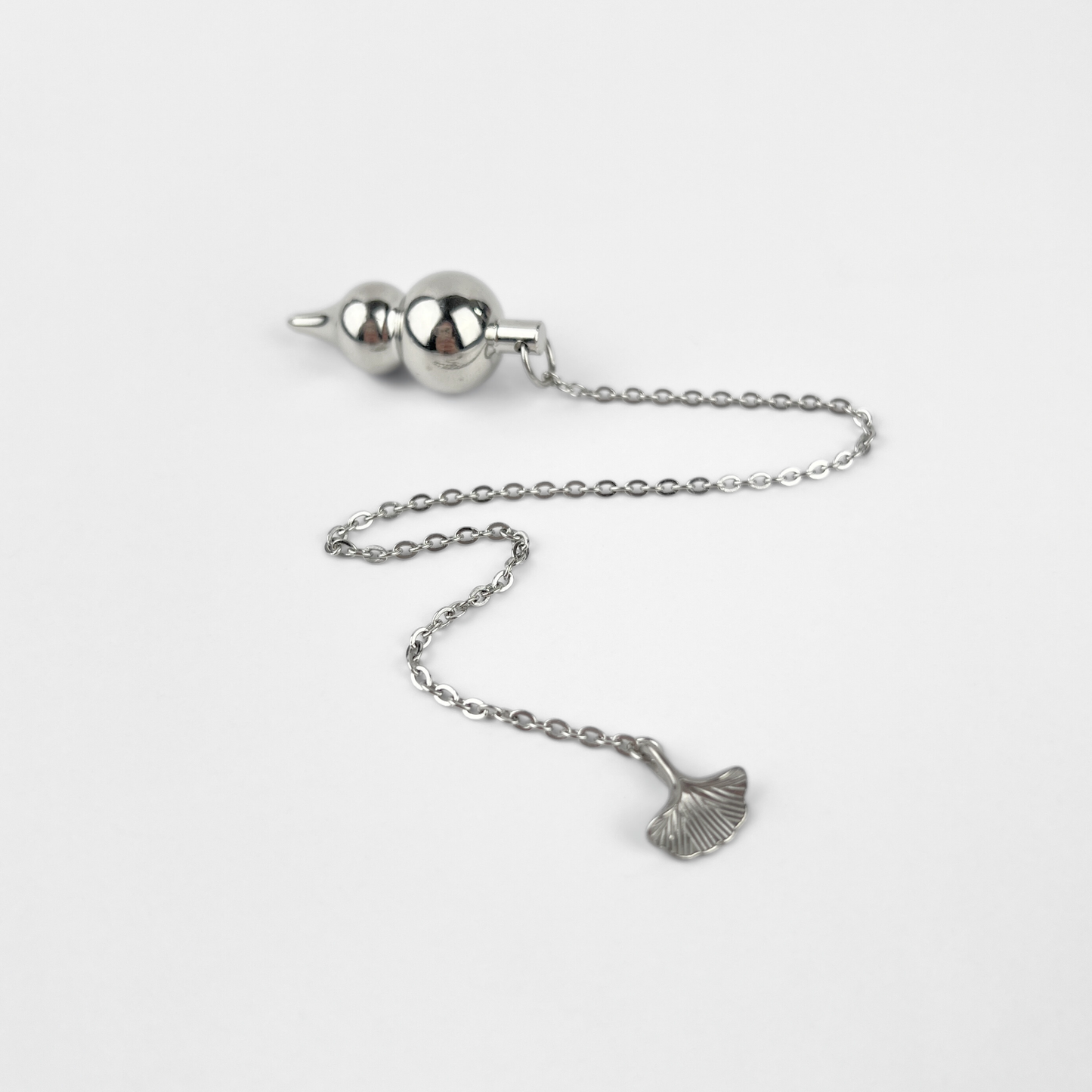 Wu Lou dowsing pendulum, feng shui gourd and ginkgo leaf