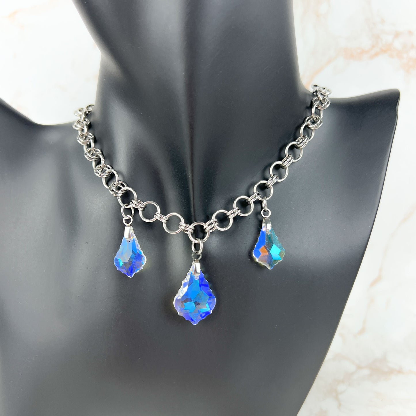 Sparkling crystal necklace, yellow and blue irridescence, chainmail chain, stainless steel