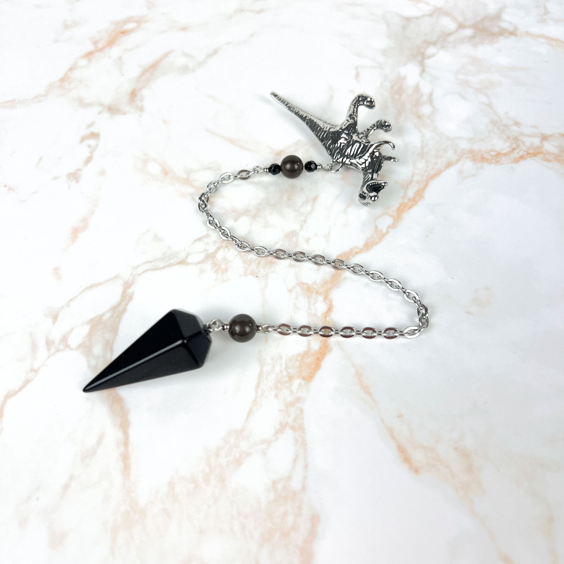 Velociraptor dinosaur dowsing pendulum, obsidian, smoky obsidian, onyx, stainless steel Baguette Magick