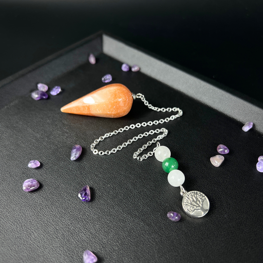 Orange and green aventurine, clear quartz, and tree of life pendulum