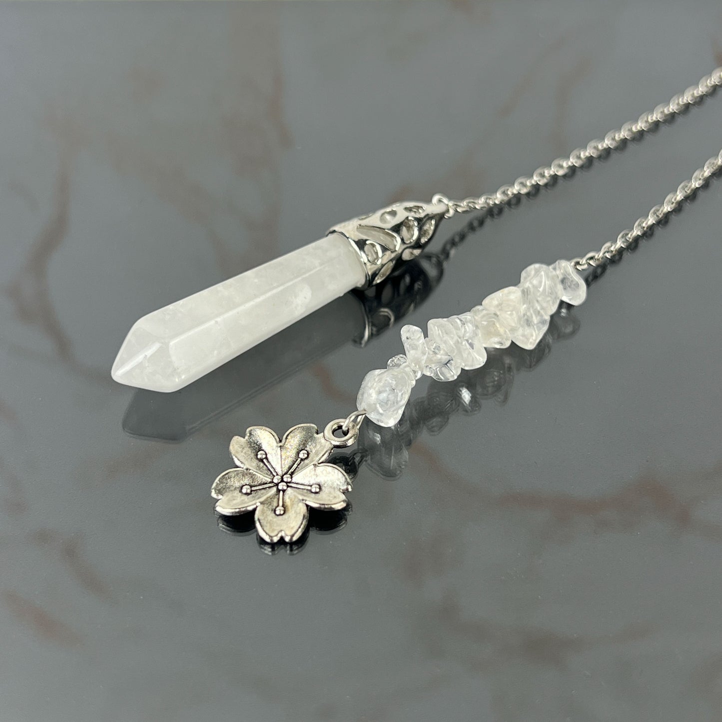 Clear quartz and flower divination pendulum