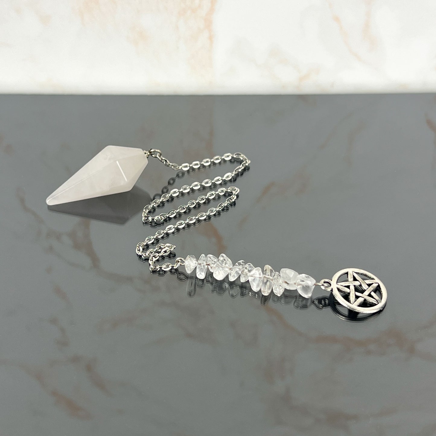 Clear quartz and pagan wiccan pentacle pendulum