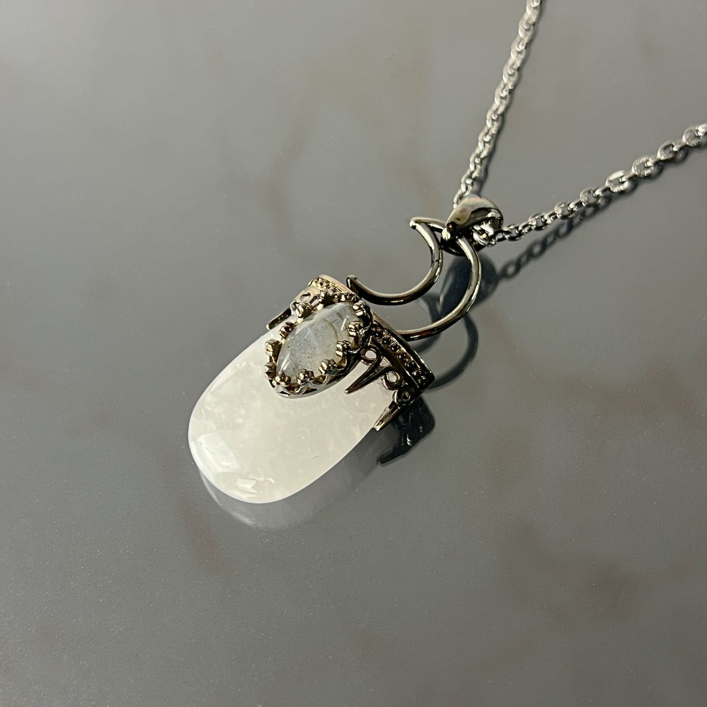 Crescent moon quartz and labradorite gunmetal-tone necklace