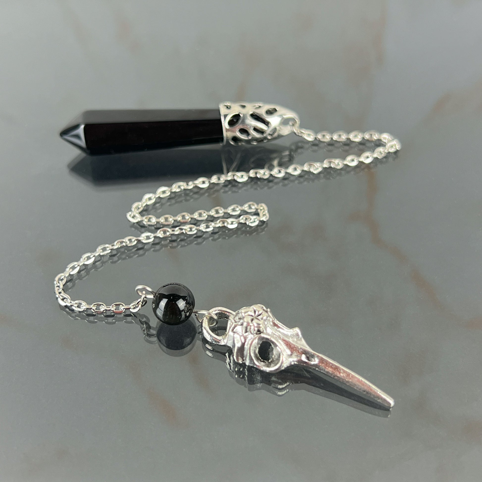 Onyx and bird skull dowsing pendulum Baguette Magick