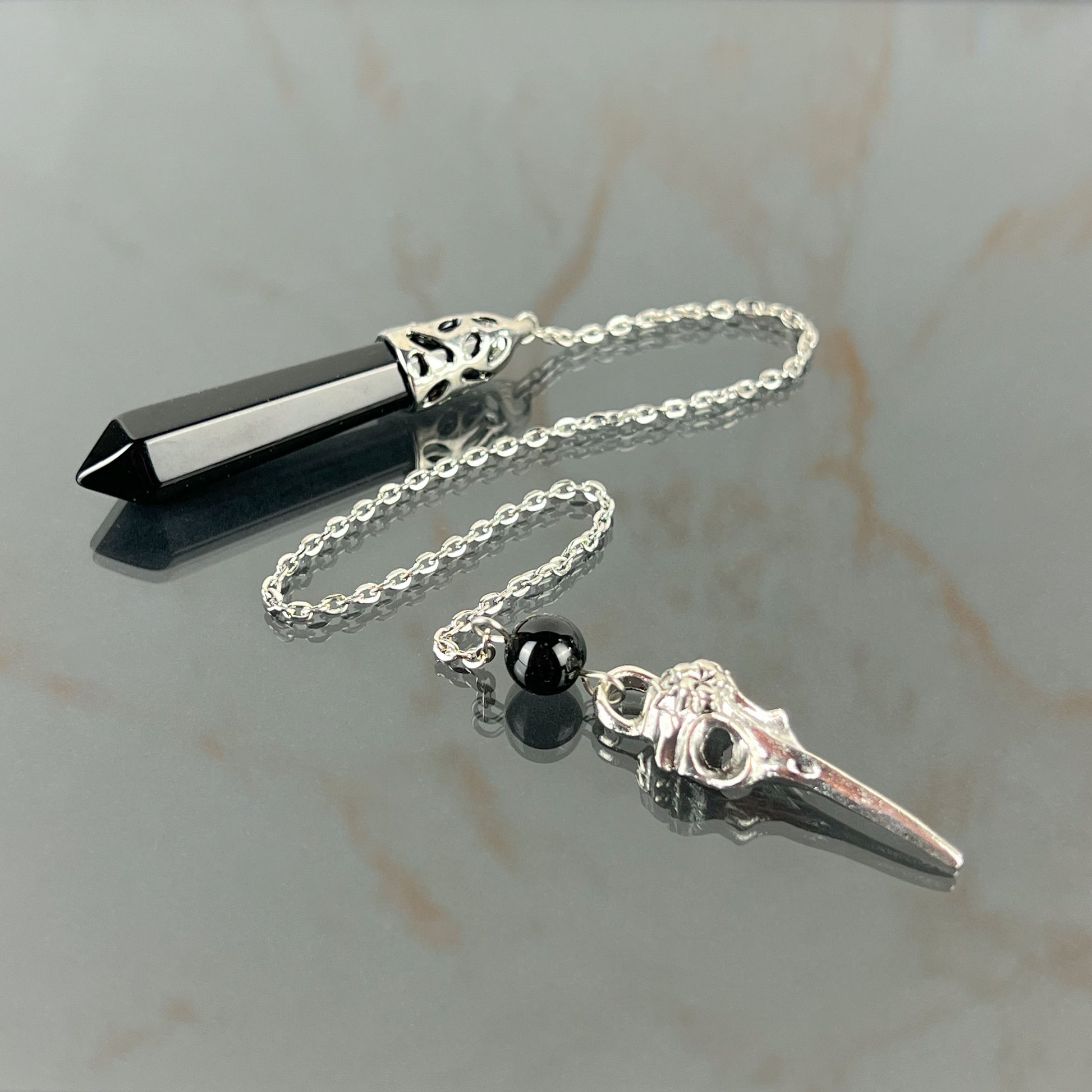 Onyx and bird skull dowsing pendulum Baguette Magick