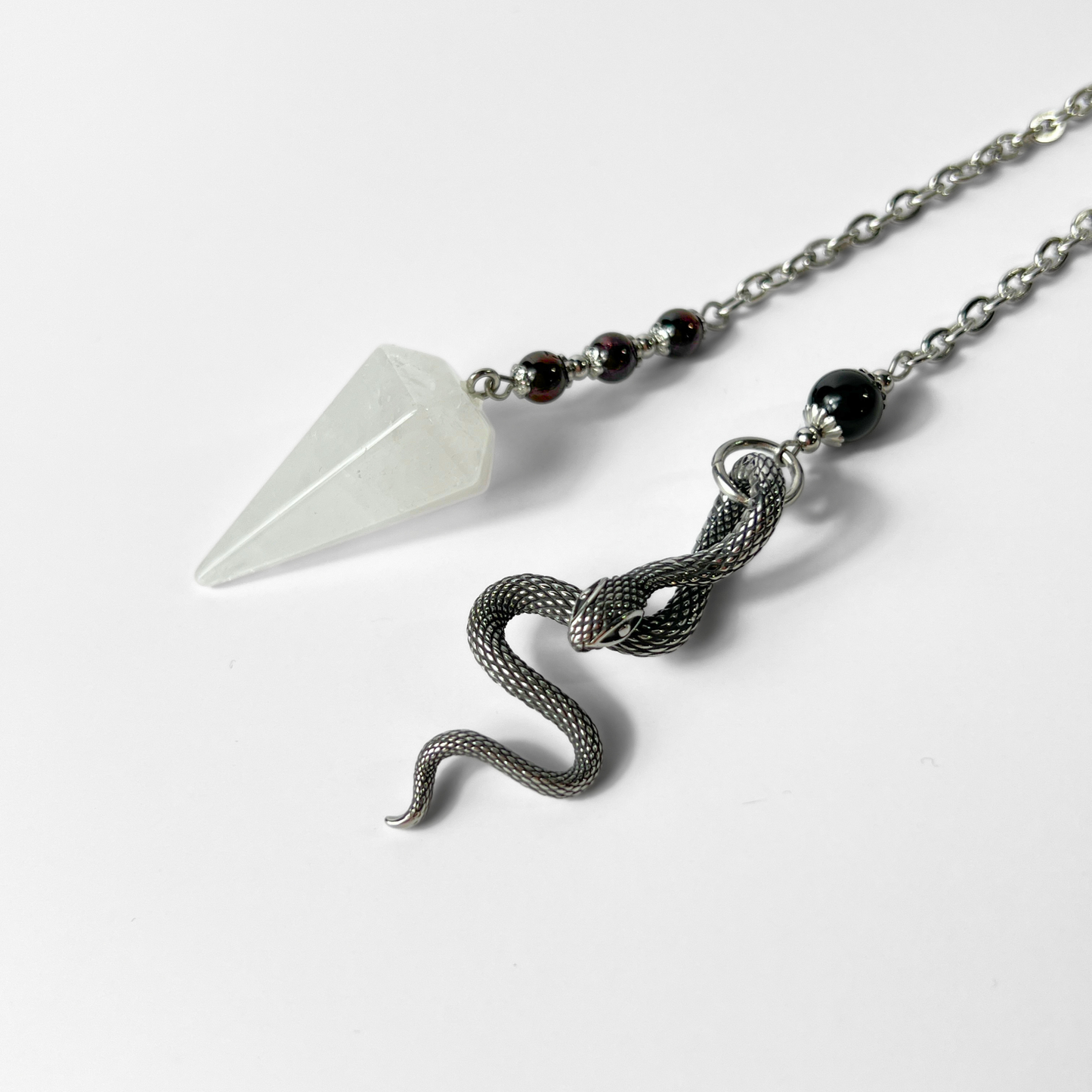 Quartz, garnet and obsidian snake dowsing pendulum Baguette Magick