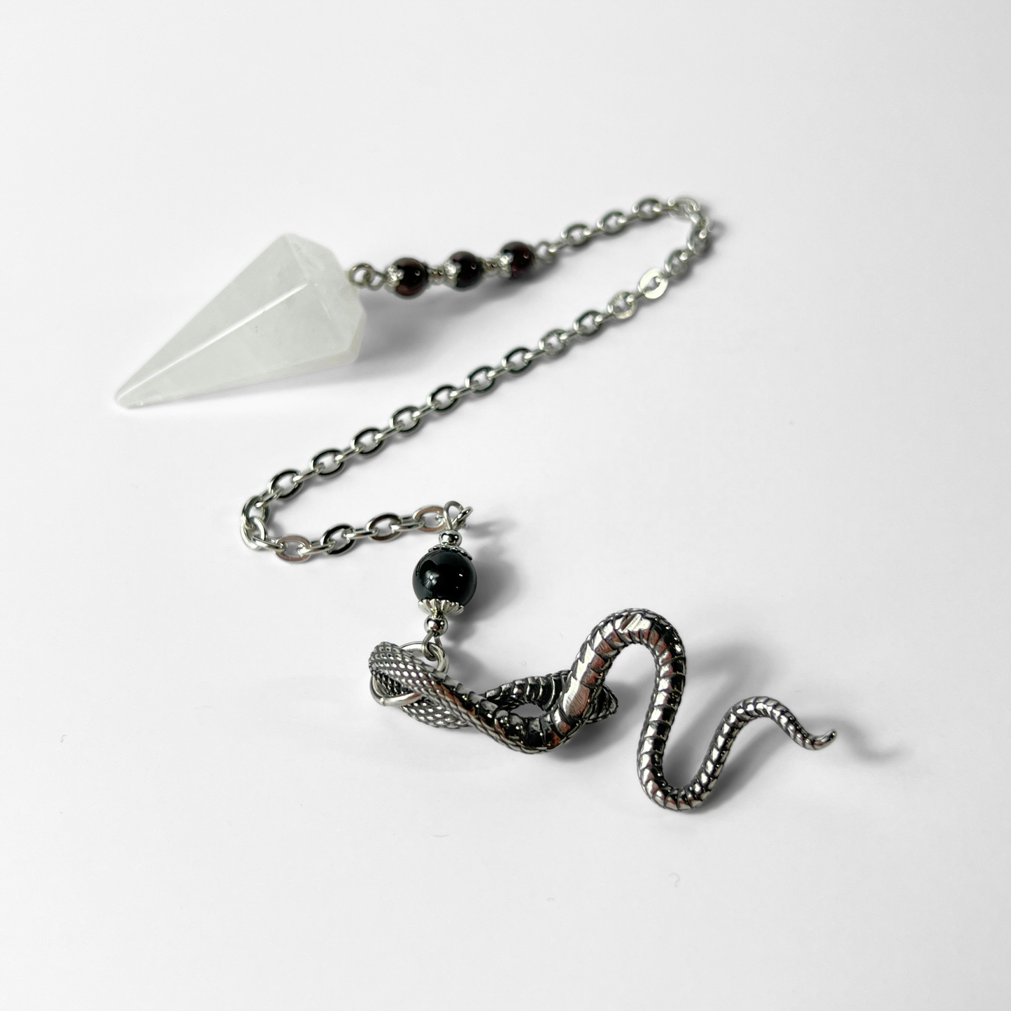 Quartz, garnet and obsidian snake dowsing pendulum Baguette Magick
