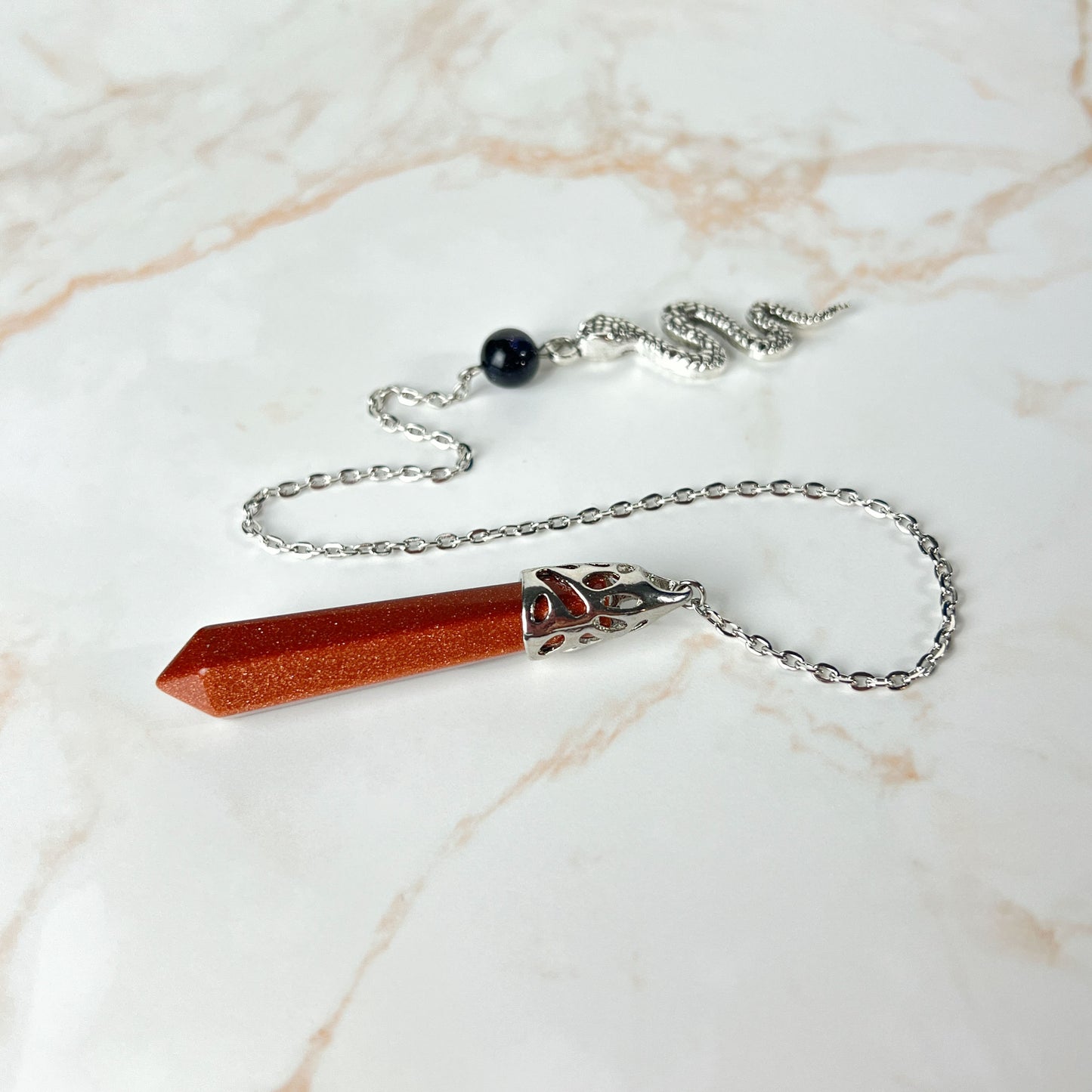 Snake dowsing pendulum, multiple gemstones Baguette Magick