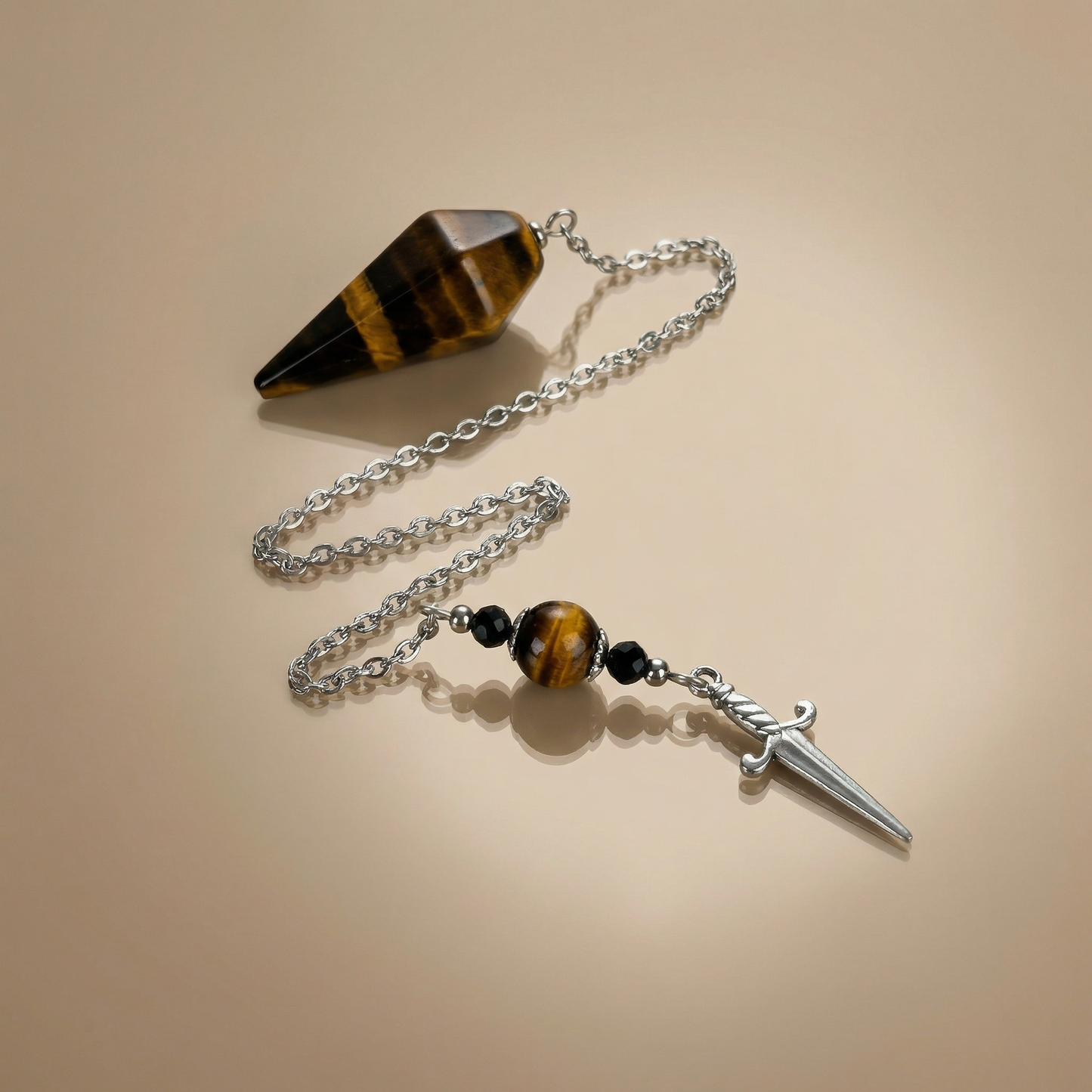 The athame pendulum, Tiger Eye, Onyx