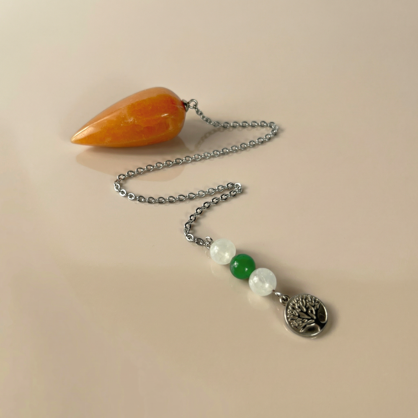 Orange and green aventurine, clear quartz, and tree of life pendulum Baguette Magick