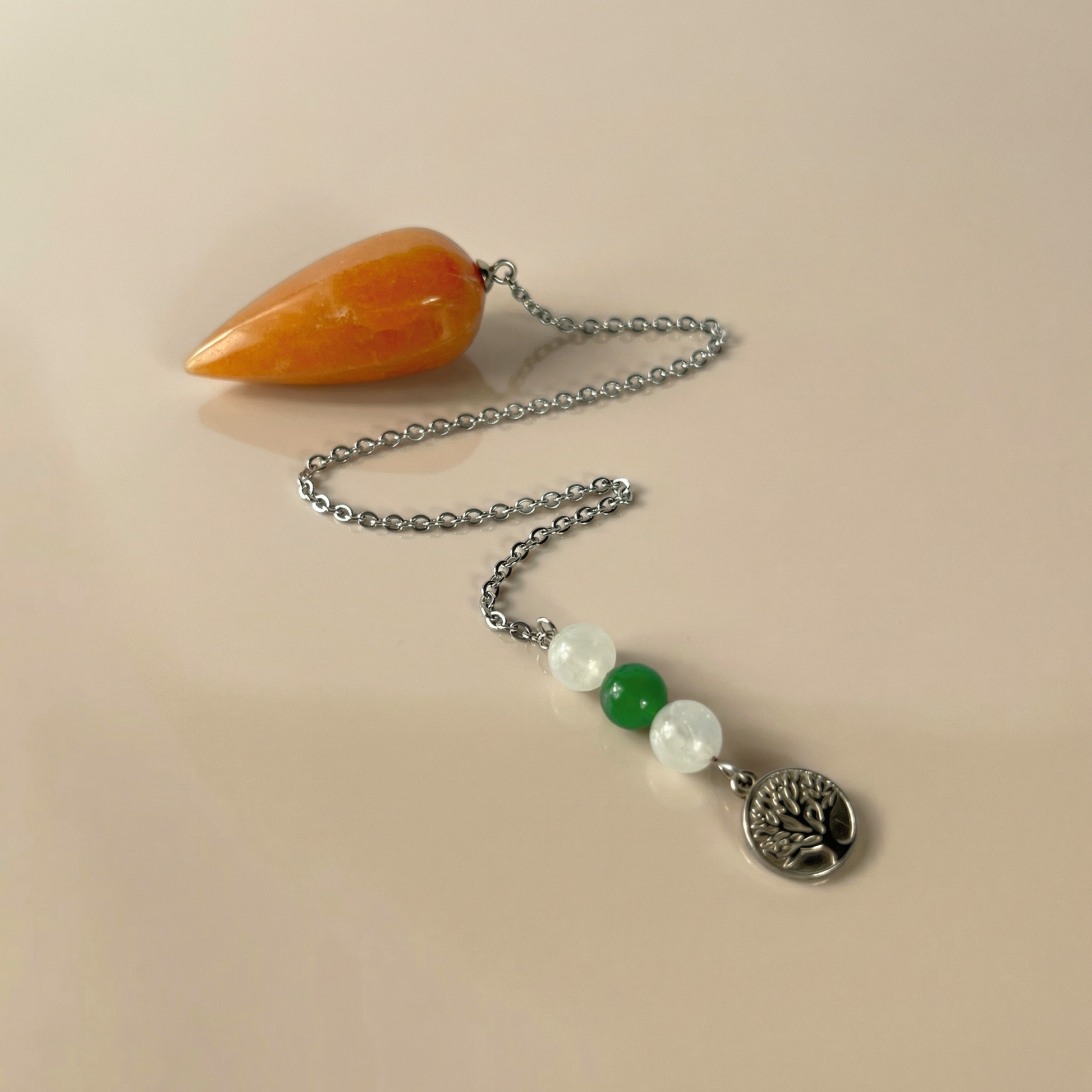 Orange and green aventurine, clear quartz, and tree of life pendulum Baguette Magick