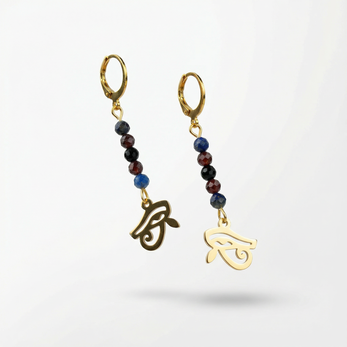 Golden Eye of Horus earrings, lapis lazuli, garnet and onyx Baguette Magick
