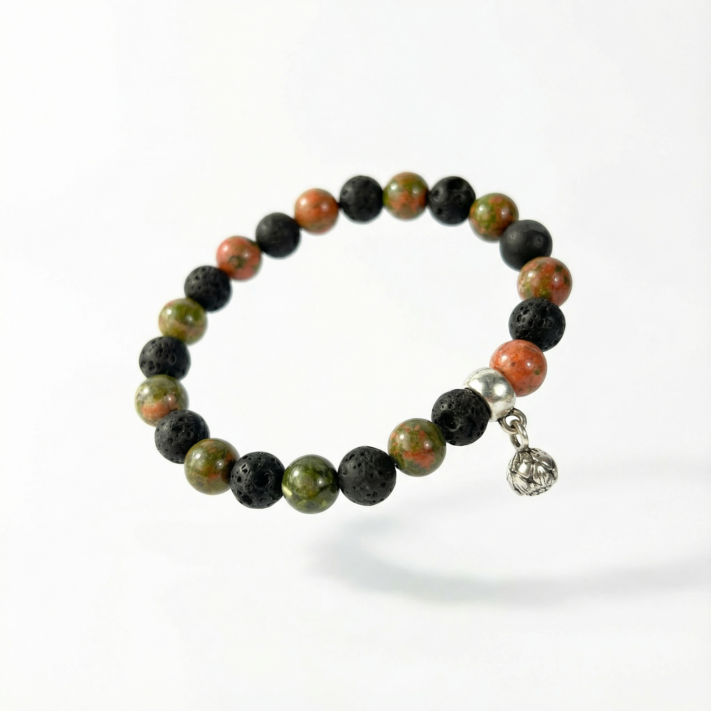 Unakite and lava mala beaded bracelet with a lotus seed charm