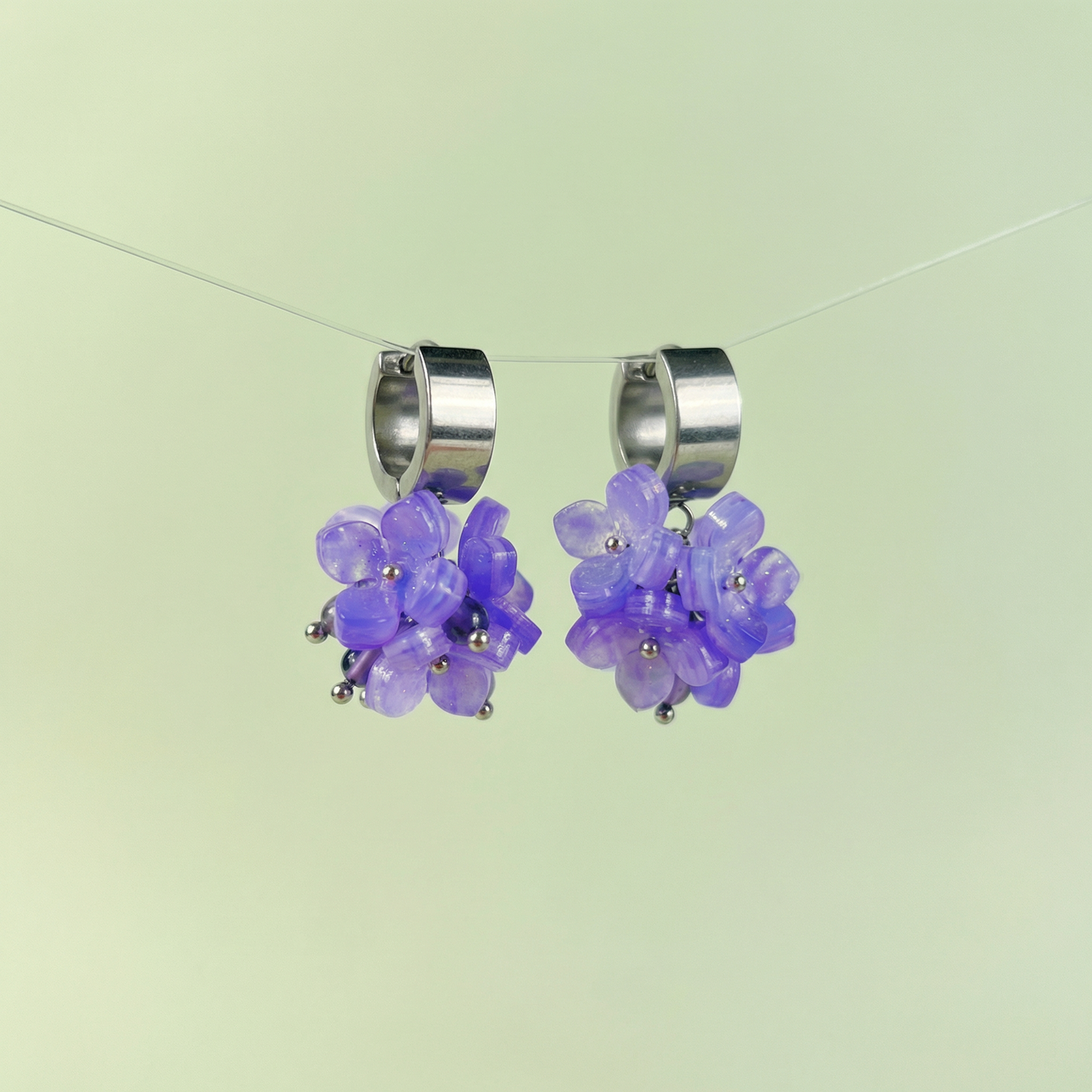 Hydrangea bloom earrings, amethyst beads on chunky huggie hoops