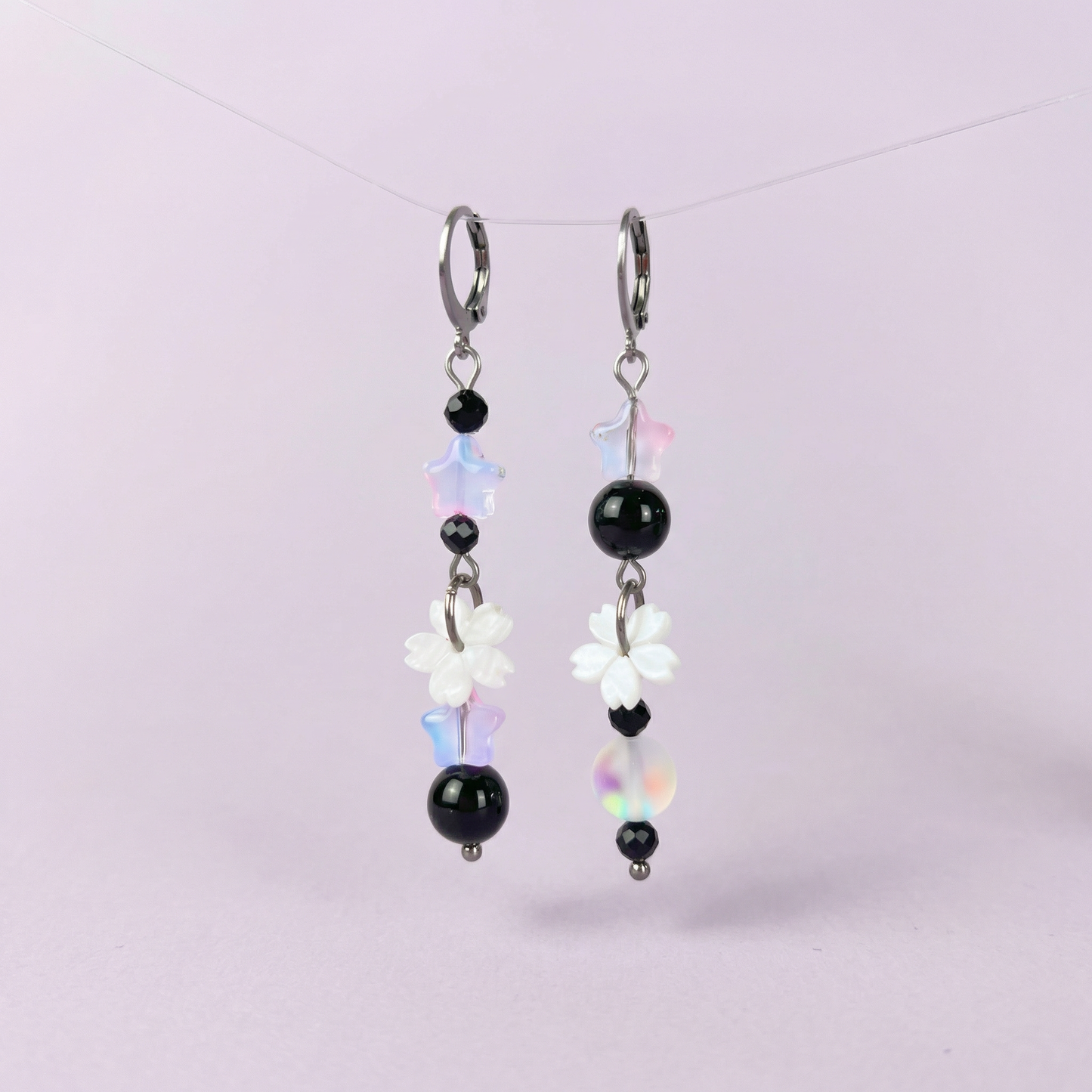 The Celestial Nocture earrings: Rainbow Obsisidan, Onyx, Holo glass, stars and Sakura flowers