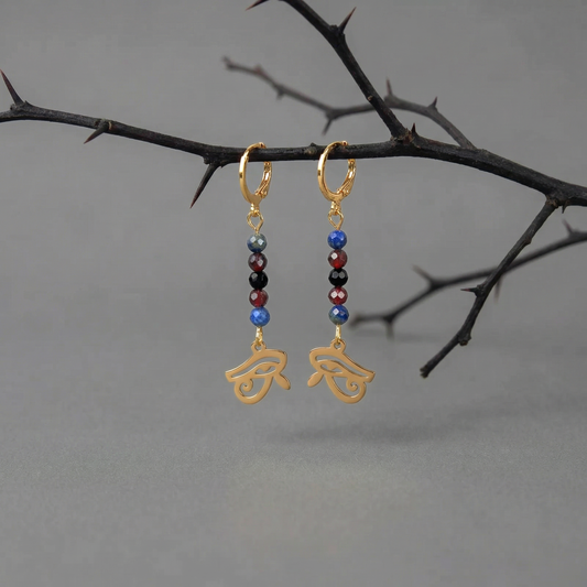 Golden Eye of Horus earrings, lapis lazuli, garnet and onyx Baguette Magick