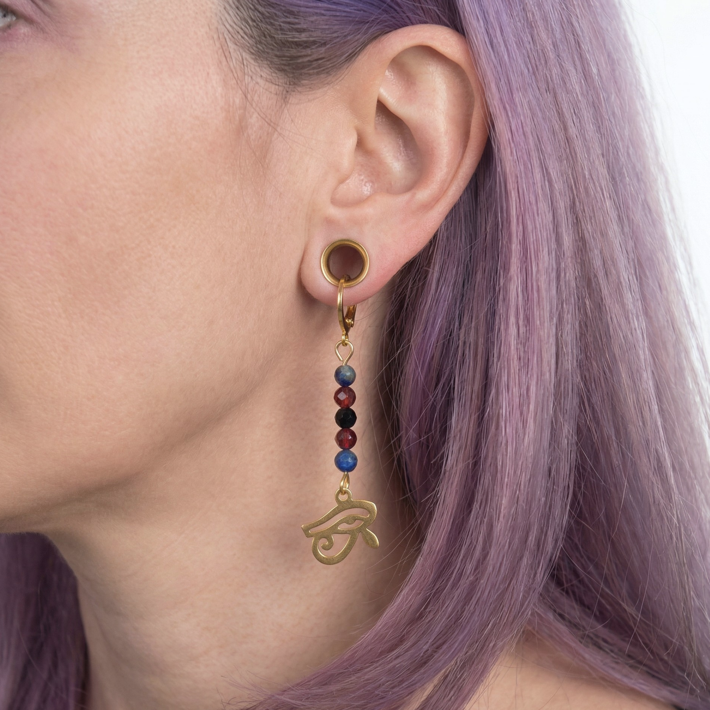 Golden Eye of Horus earrings, lapis lazuli, garnet and onyx Baguette Magick