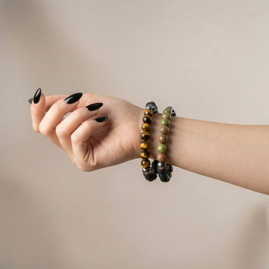 Lava rock and unakite or tiger's eye mala bracelet, with skulls Baguette Magick