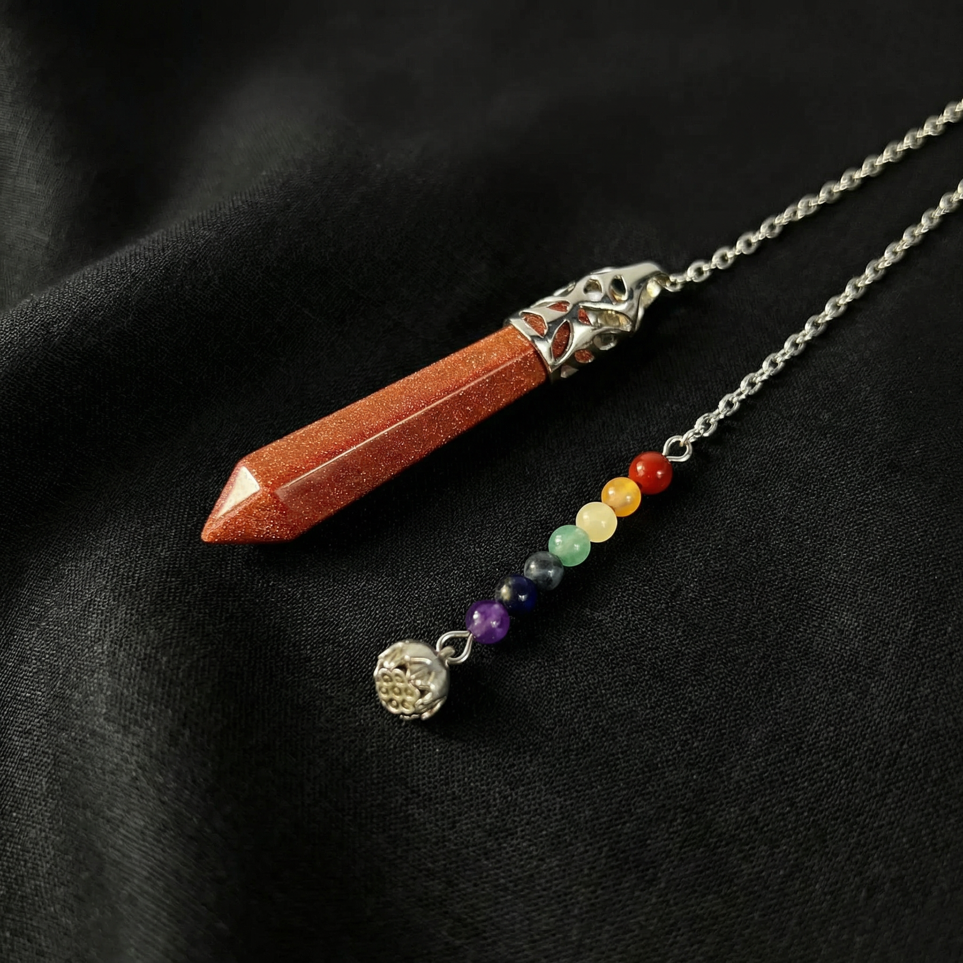 7 chakras goldstone pendulum with a lotus seed Baguette Magick