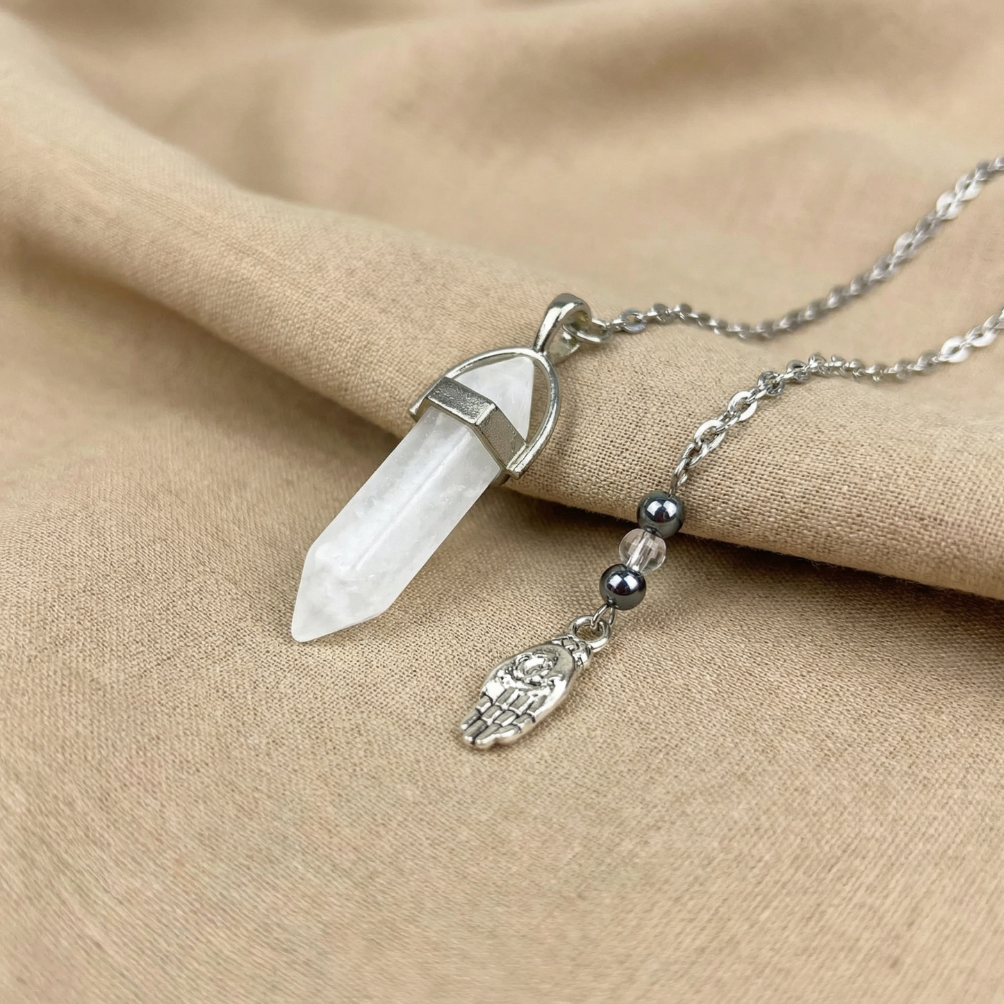 Quartz and hematite hand pendulum