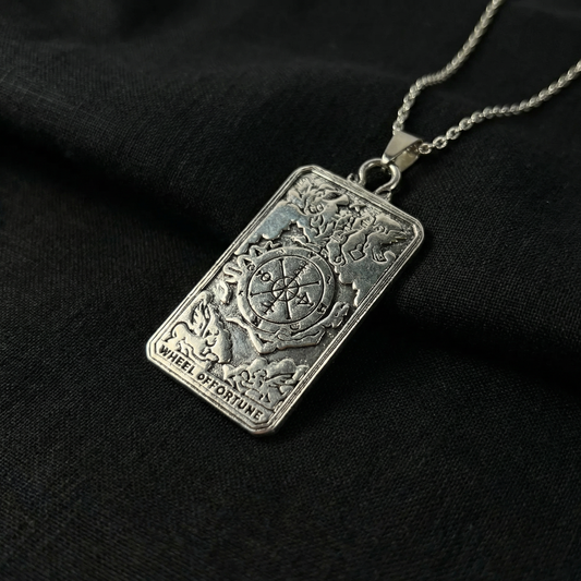 Wheel of fortune tarot arcana necklace with a reversible pendant