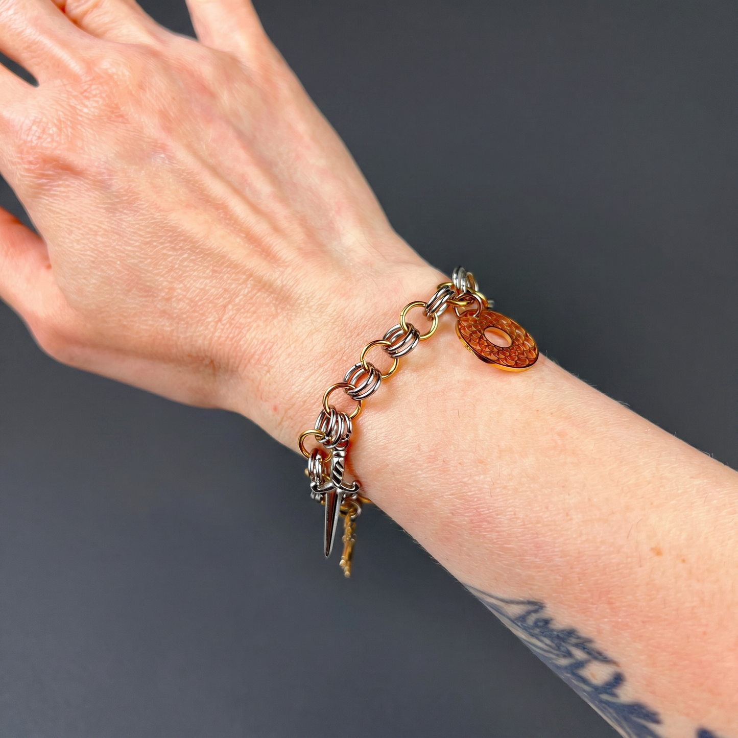 Chainmail charm bracelet, gold and silver tones Baguette Magick