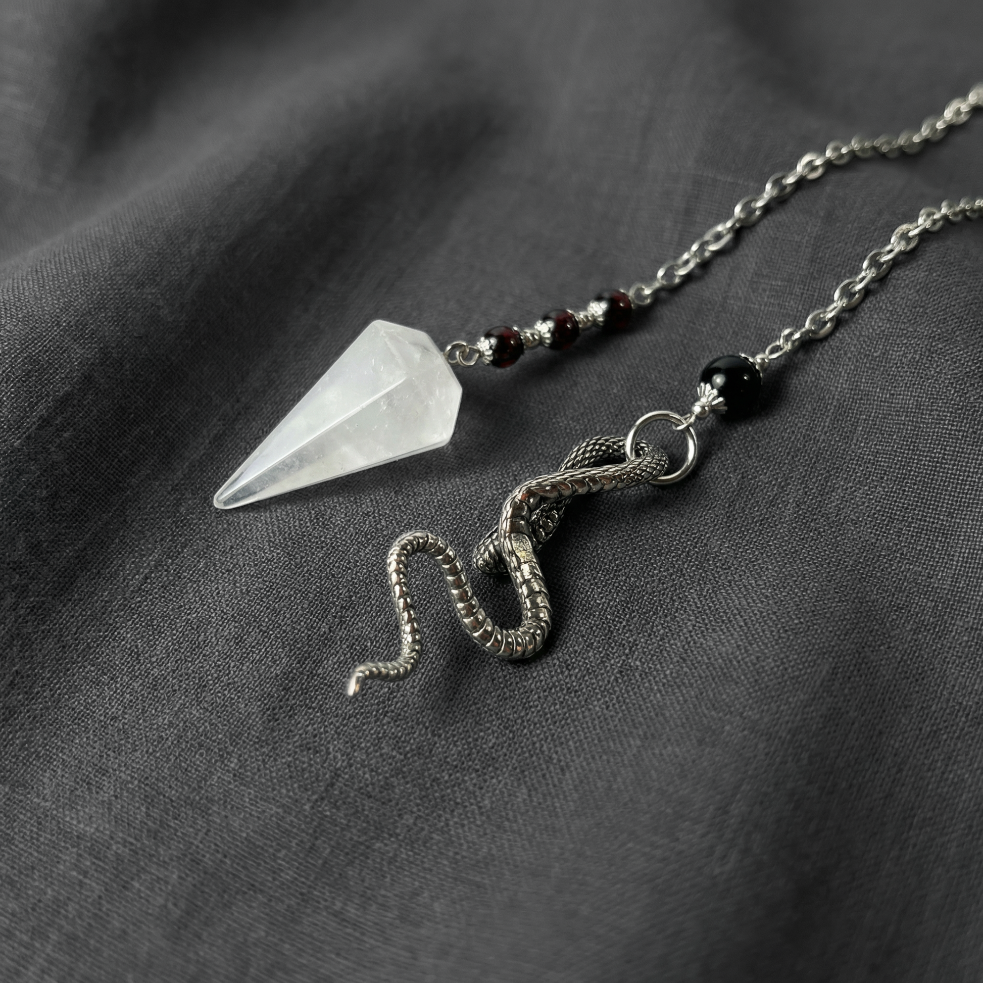 Quartz, garnet and obsidian snake dowsing pendulum Baguette Magick