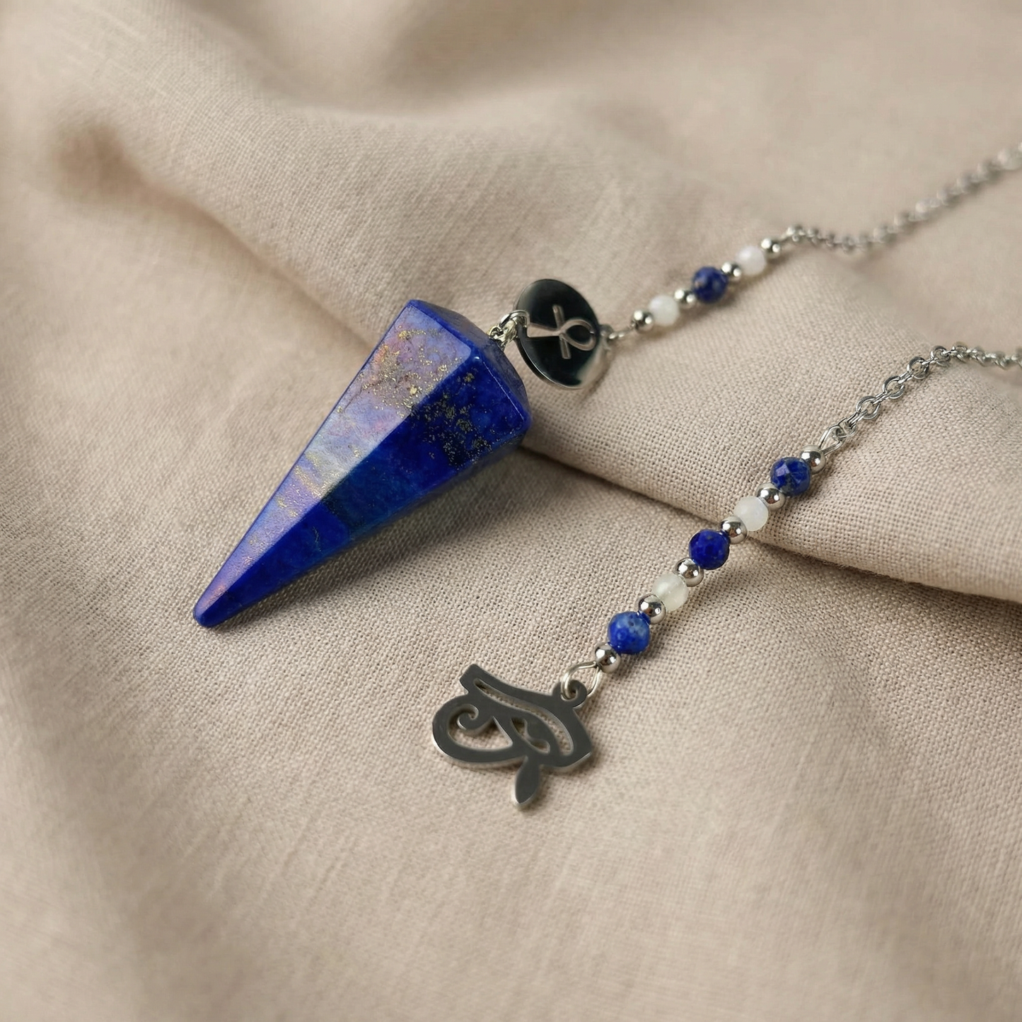 Pendule de radiesthésie avec lapis-lazuli, pierre de lune, œil d'Horus et Ankh
