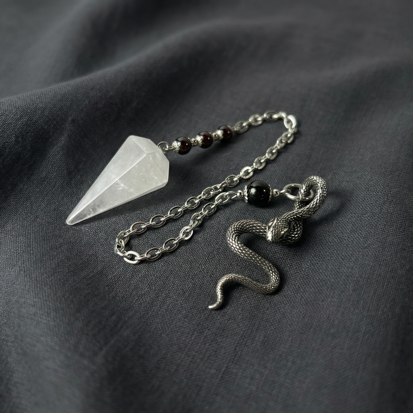 Quartz, garnet and obsidian snake dowsing pendulum Baguette Magick