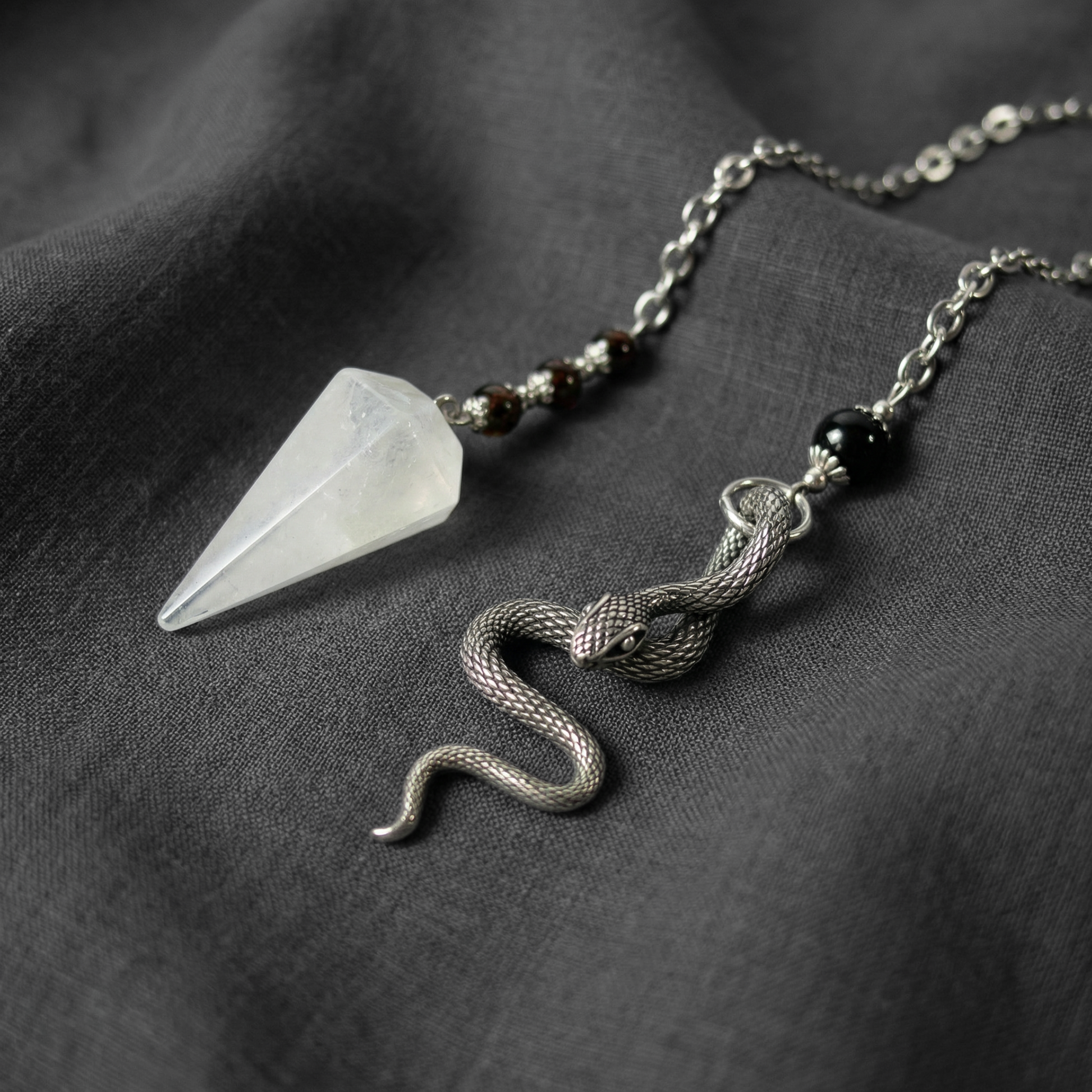 Quartz, garnet and obsidian snake dowsing pendulum Baguette Magick