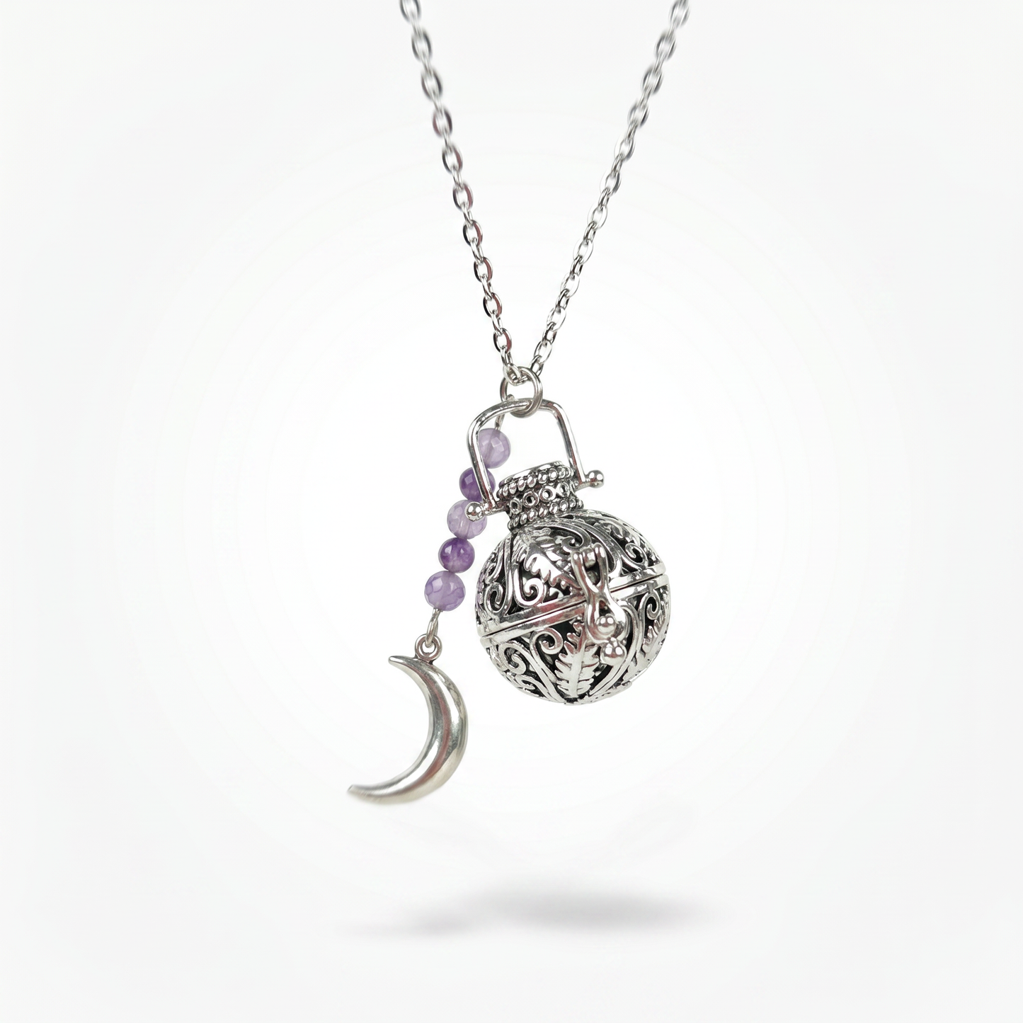Rococo amethyst locket and Moon crescent necklace