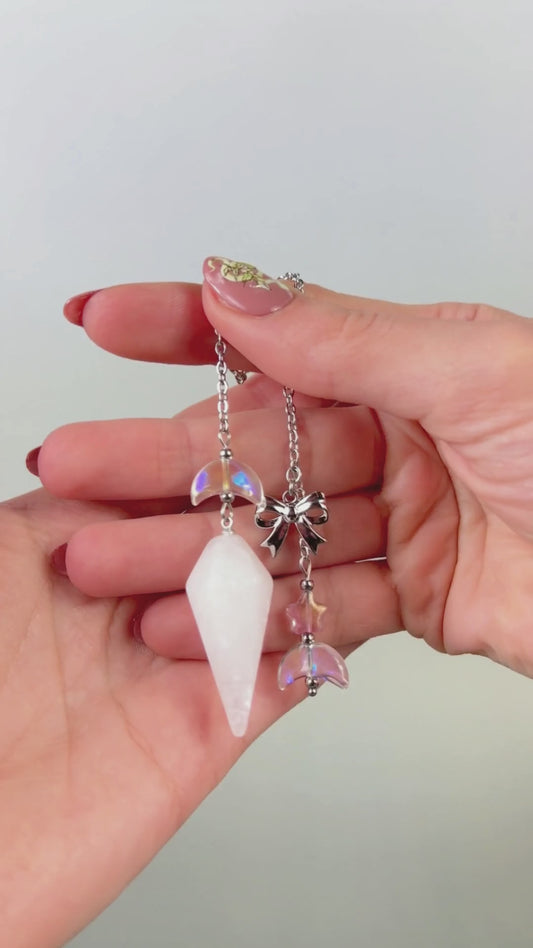 Celestial Clear Quartz dowsing pendulum, with moon, star & bow charms