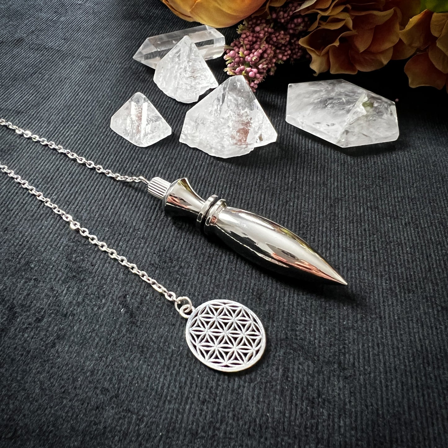 Metal Thot pendulum with a flower of life symbol The French Witch shop