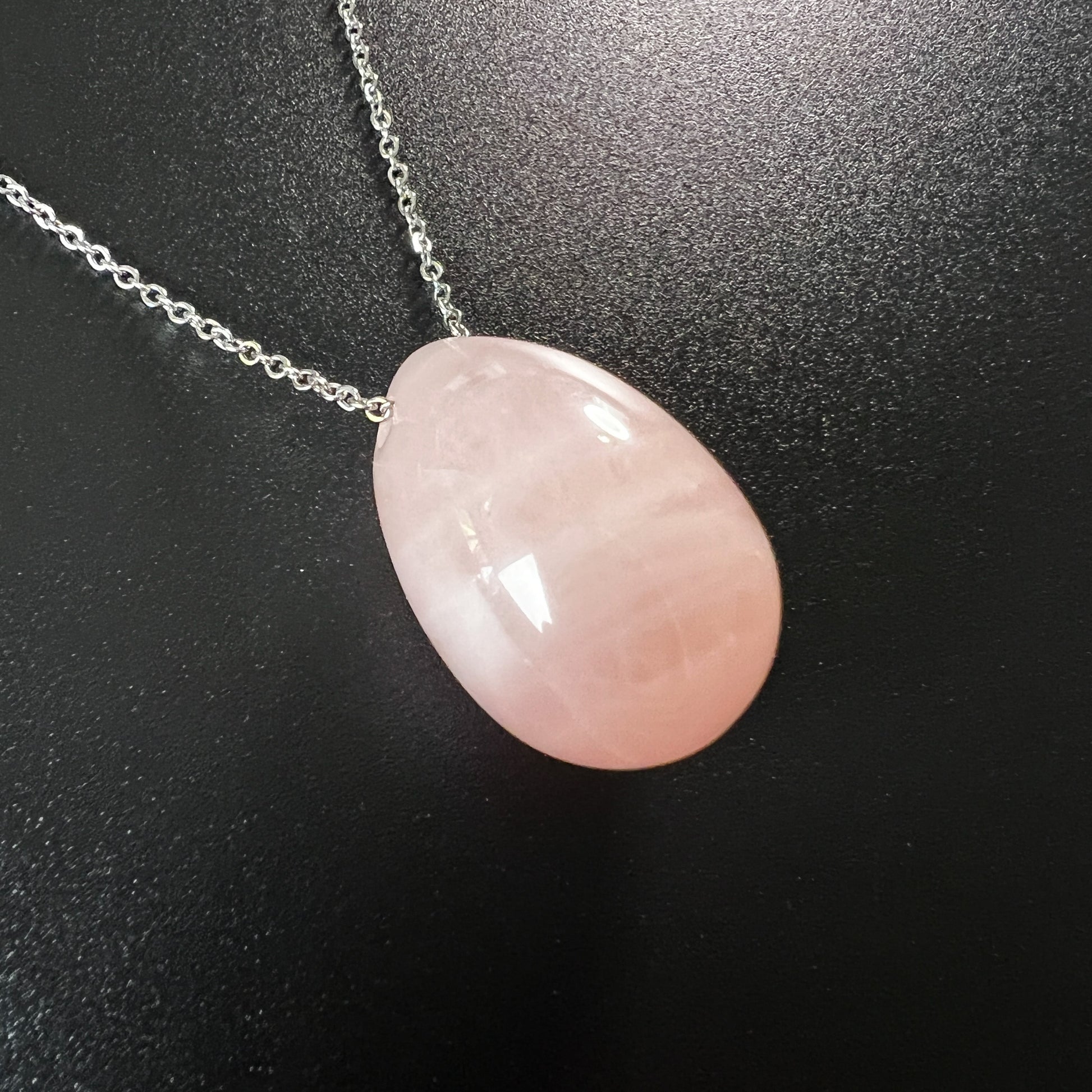 Rose quartz gemstone egg and stainless steel necklace The French Witch shop