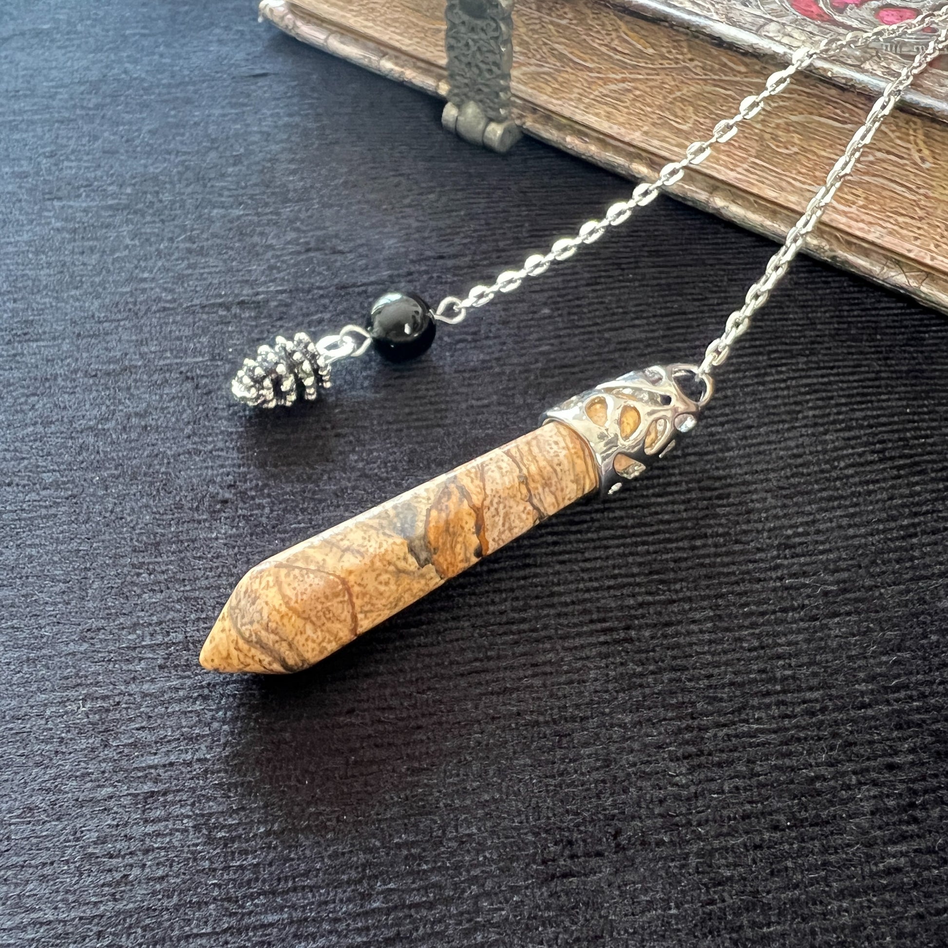 Gemstone divination pendulum picture jasper and obsidian with a pinecone spiritual charm dowsing tool