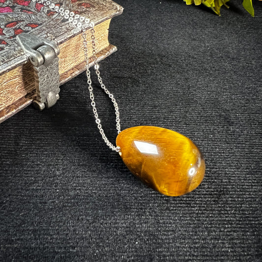 Tiger's eye gemstone egg and stainless steel necklace The French Witch shop