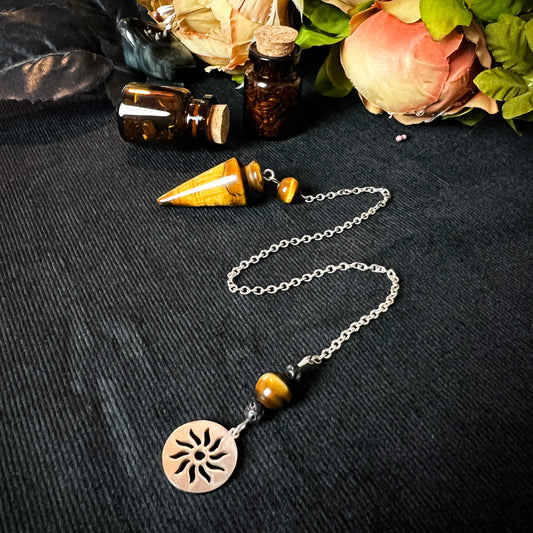 Tiger-eye and stainless steel pendulum with a Sun charm The French Witch shop