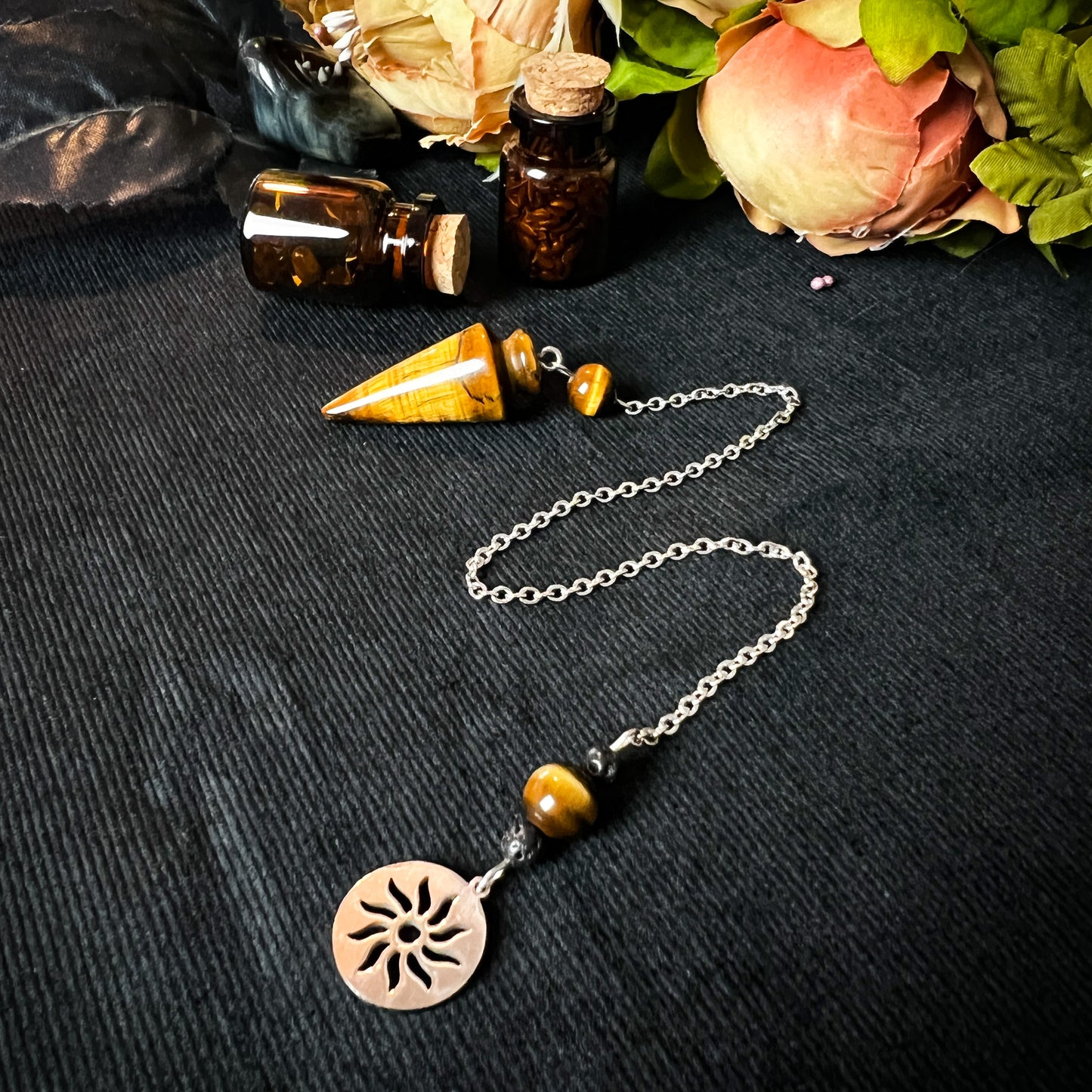 Tiger eye and stainless steel pendulum with a Sun charm Baguette Magick