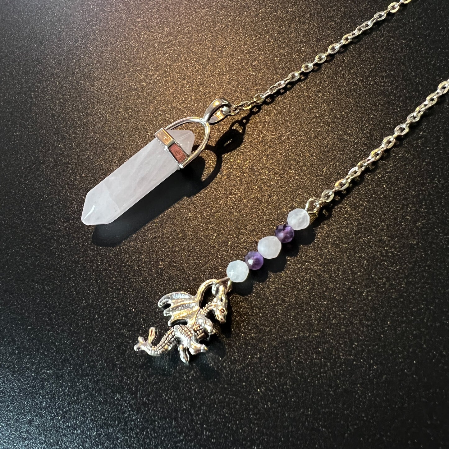 Rose quartz and amethyst dragon dowsing pendulum The French Witch shop