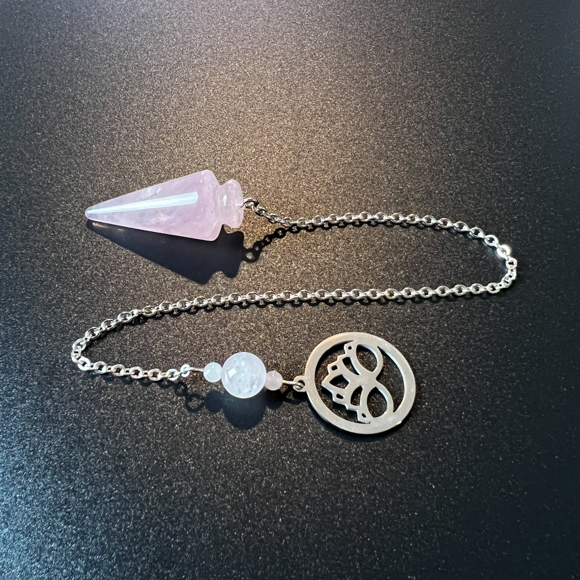 Rose quartz and stainless steel lotus flower pendulum The French Witch shop